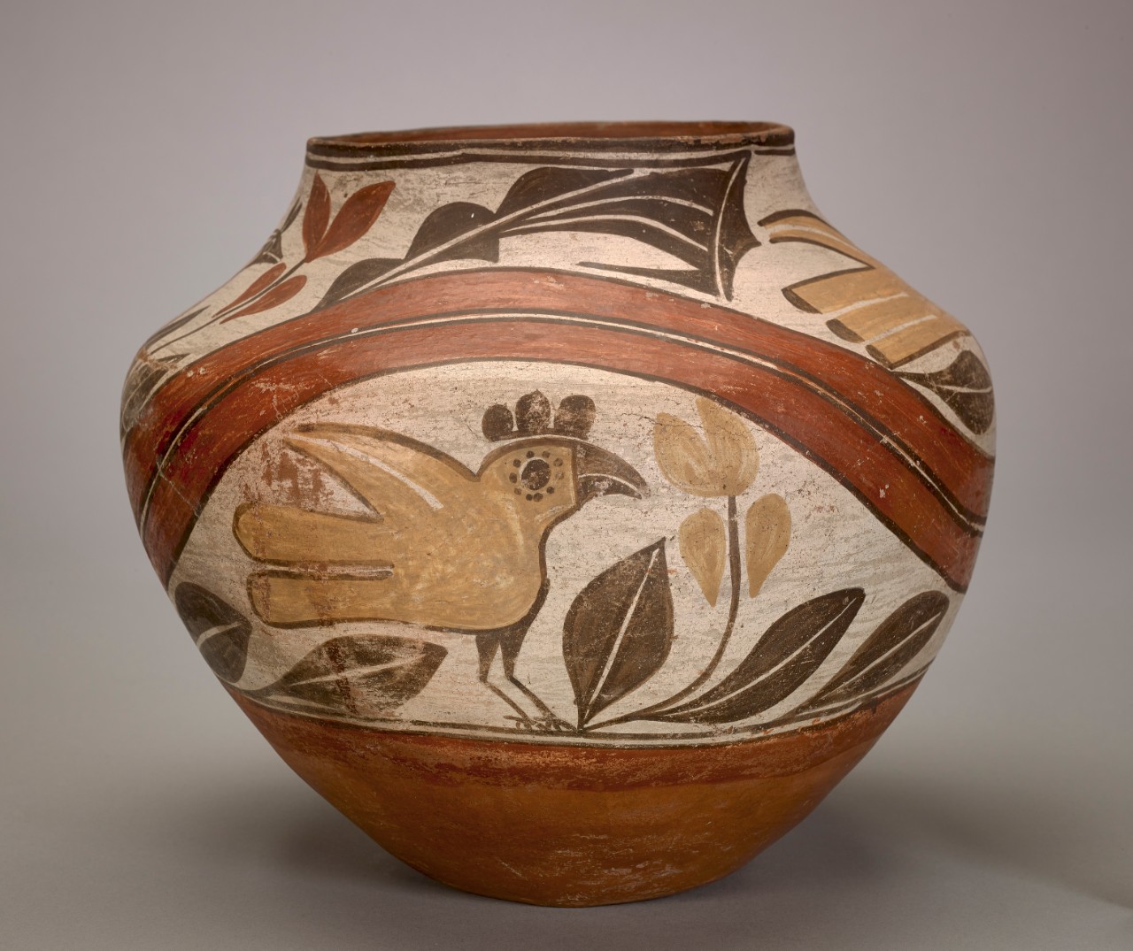 Unidentified Zia artist, Polychrome pot with yellow birds separated by double red lines, ca. 1920, clay with pigment Unidentified Zia artist, Polychrome pot with yellow birds separated by double red lines, ca. 1920, clay with pigment