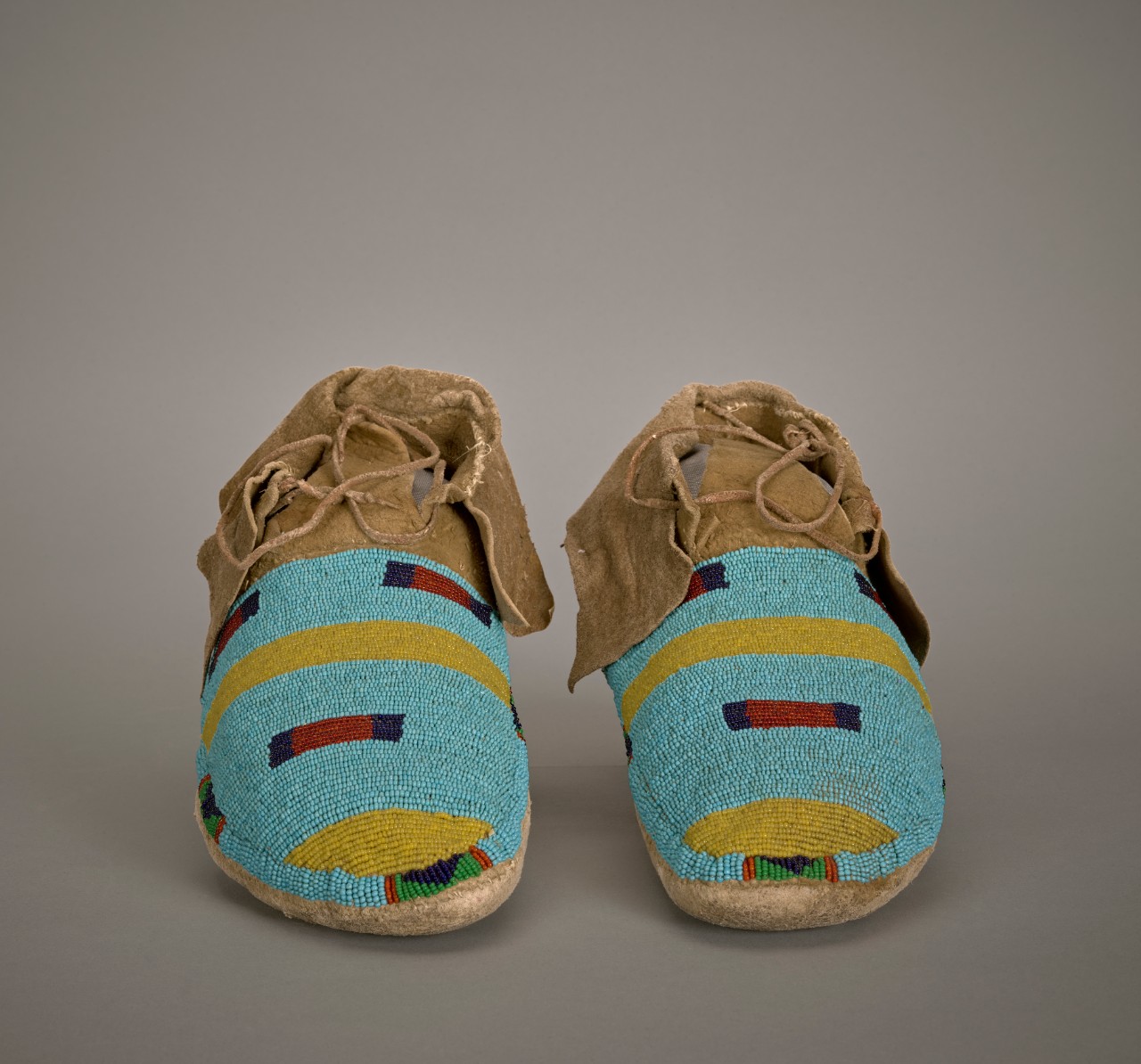 Unidentified Crow (Apsáalooke) artist, Wedding Moccasins, early 20th century, rawhide with beads Unidentified Crow (Apsáalooke) artist, Wedding Moccasins, early 20th century, rawhide with beads